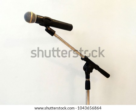 Microphone with cement wall background