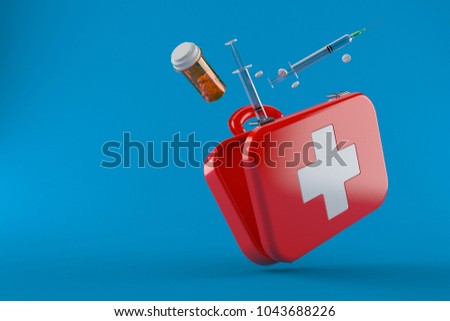 First aid kit with syringe and drugs isolated on blue background. 3d illustration