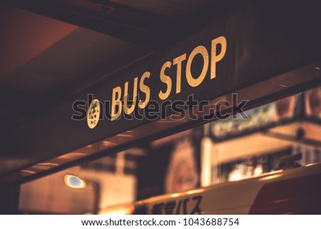 Vintage tone closeup sign bus stop on the taxi station