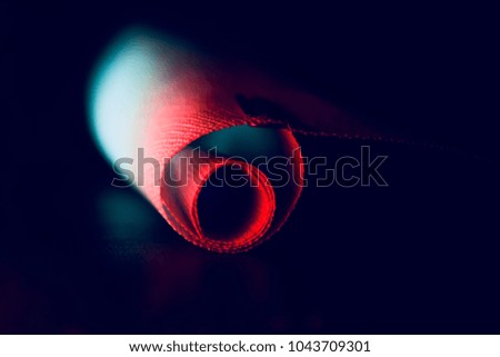 Abstract clothing materials roll isolated with lighting effects creative photograph