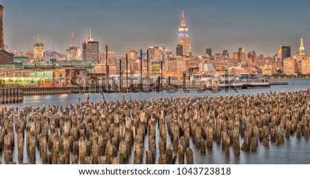 Manhattan midtown skyline from Jersey City at dusk.