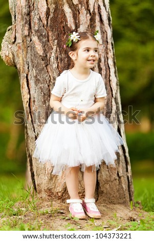 Adorable little girl outdoors