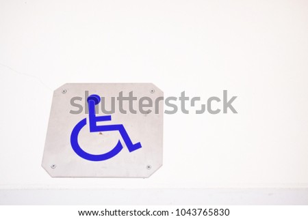 a public toilet with disabled access on white wall