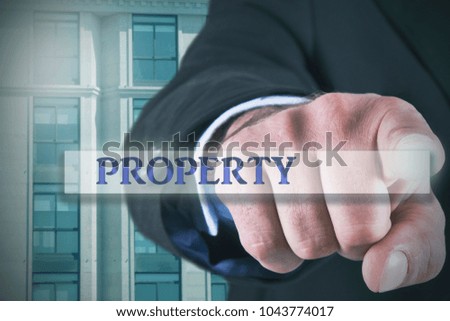 Businessman with real estate card. business concept