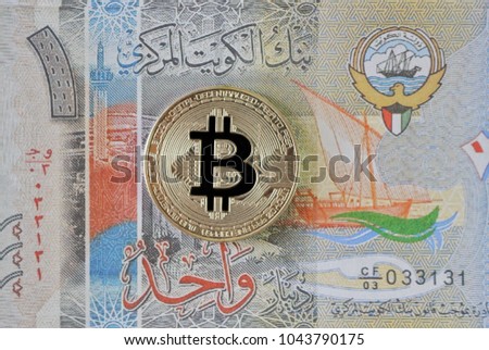 Bitcoin on Kuwait Dinar Banknotes Background , Cryptocurrency concep