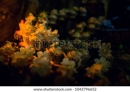 wedding cake on the wooden plate Royalty-Free Stock Photo #1043796652