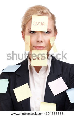 Attractive attractive businesswoman with colored stickers on her face, isolated on white background