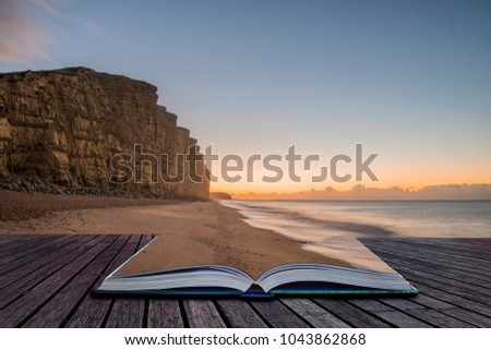 Creative book image of Beautiful long exposure sunrise landscape image of West Bay in Dorset England