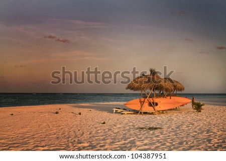 Landscape photo of Boat on beach along the ocean