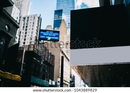 Publicity mock up area for advertising or commercial information Lightbox on exterior of modern buildings in downtown,blank billboards with copy space on skyscraper facade in business district of city