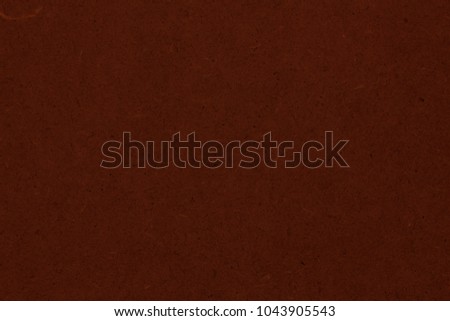 Dark brown earth texture. Saturated color. Designer background. Raster image.