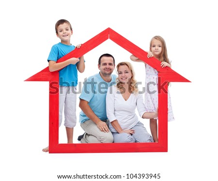 Young family with two kids holding house sign - new home concept, isolated