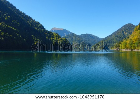 Amazing nature landscape view of beautiful lake Ritsa and Caucasian mountains, Abkhazia