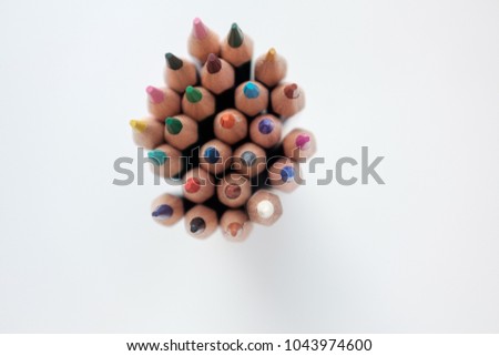 Colour pencils isolated on white background.Close up.