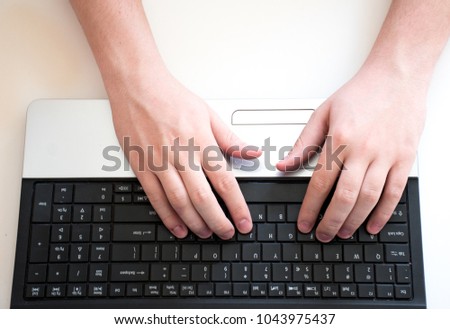 Typing on keyboard with two hands