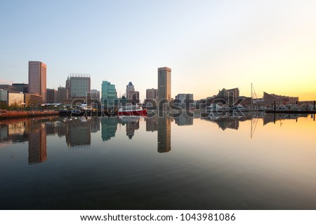 Downtown city skyline and Inner Harbor at dawn, Baltimore, Maryland, USA
