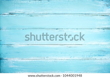 Vintage beach wood background - Old weathered wooden plank painted in blue color.