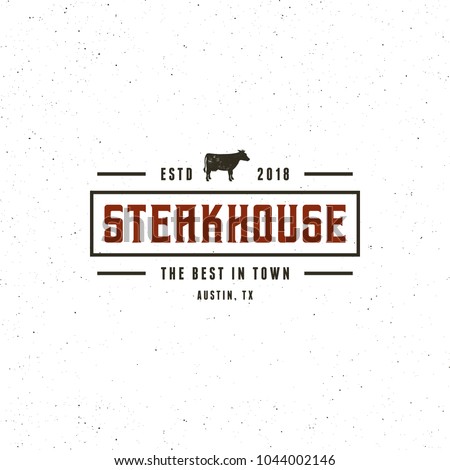 vintage steak house logo. retro styled grill restaurant emblem, badge, design element, logotype template. vector illustration Royalty-Free Stock Photo #1044002146