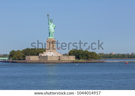 Statue of Liberty and panoramic view of Manhattan City skyline from the Staten Island public ferry. New York. USA.