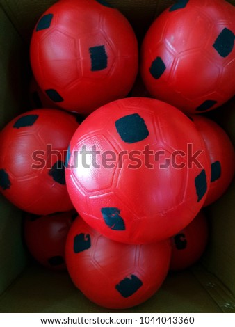 Red plastic soccer ball Playground Sports is a good thing. Make your body fit and healty Children will spend their free time as well.