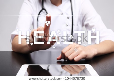 Good health check. Medical doctor using modern virtual screen computer.