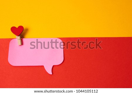  pink note on a colorful background, free place                              