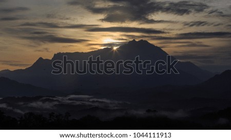 Beautiful sunrise with Mount Kinabalu as background on 28 January, 2017 After earthquake on 6 June, 2015 with Magnitude 6.0 / Beautiful Mount Kinabalu, Sabah , Borneo.