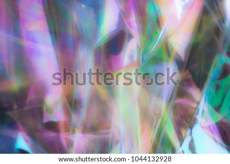 Modern foil holographic background. Futuristic blurred template. Neon pastel rainbow. Abstract colorful gradient. Bright and shiny hipster style for covers. Marbleized effect