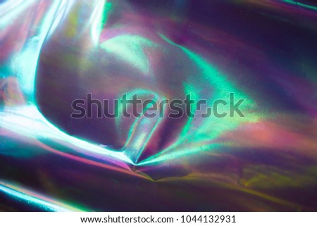 Modern foil holographic background. Futuristic blurred template. Neon pastel rainbow. Abstract colorful gradient. Bright and shiny hipster style for covers. Marbleized effect