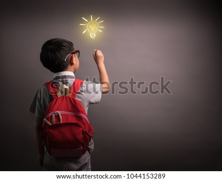 Elementary school kid student drawing doodle with child's imagination for national back to school month, education concept
 Royalty-Free Stock Photo #1044153289