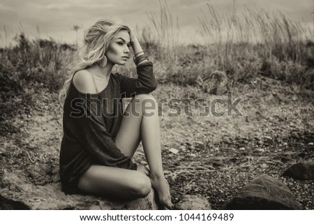 beautiful woman sitting, Sepia color