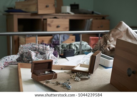 Bedroom Ransacked During Burglary Royalty-Free Stock Photo #1044239584