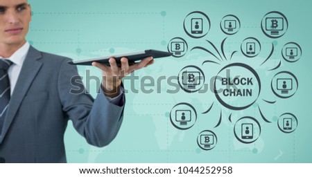 Digital composite of Block chain chart icons and man holding tablet