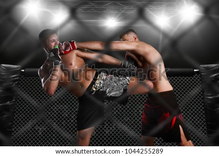 sparring two fighters in the arena