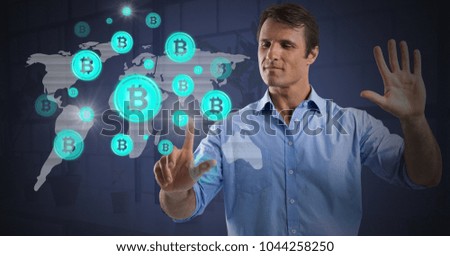 Digital composite of Businessman touching bit coin graphic icons on world map