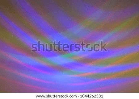 Abstract pattern of a disco lamp that puts light on the wall in blue, red and green.