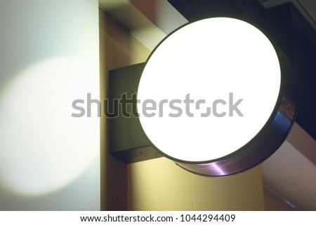 Round light up signboard of shops and restaurants mock up logo taken at night