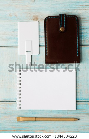 Corporate branding mockup template, isolated on wooden and leather background.