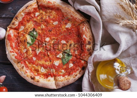 Pizza with tomato paste and garlic
