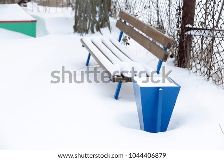 Playground covered with snow in winter