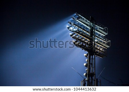 Stadium lights at an sport arena stadium Royalty-Free Stock Photo #1044413632