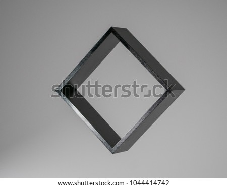 black square isolated on grey background, freestanding black frame, abstract framework photography