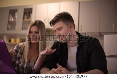 Young woman and men studying together.