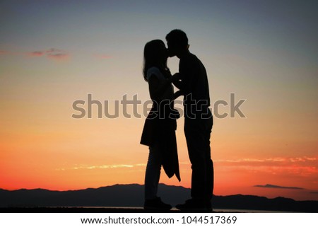 Silhouette of a couple loving each other