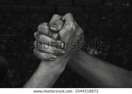 Brothers’ strong handshake, brothers’ love