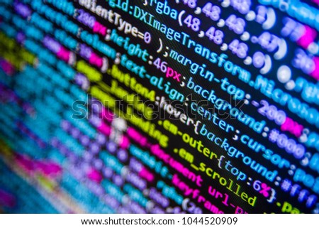 Technology background. Software source code. Mobile app building. Software source code. Software abstract background. Computer script typing work.  CSS, JavaScript and HTML usage. 