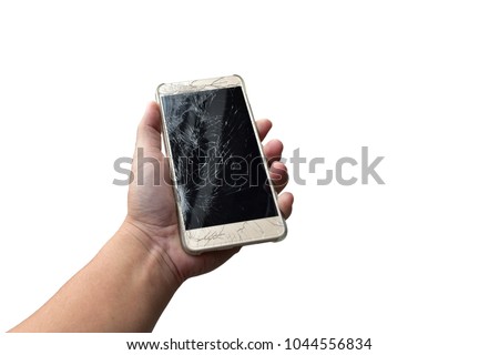 a male hand, holding a smartphone with cracked screen, isolated on white background.