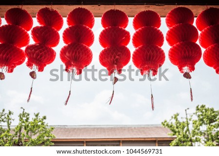 Many Red paper lantern auspicious of the Chinese. The letters in the picture mean "wealth, fortune, blessing