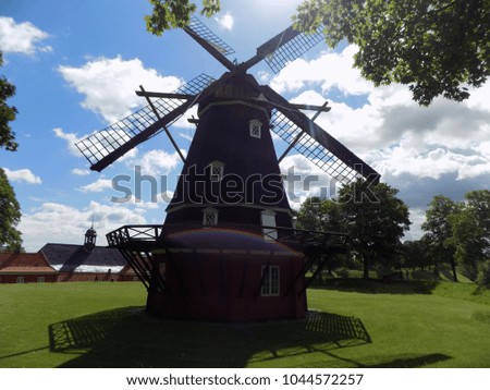 Windmill with rainbow