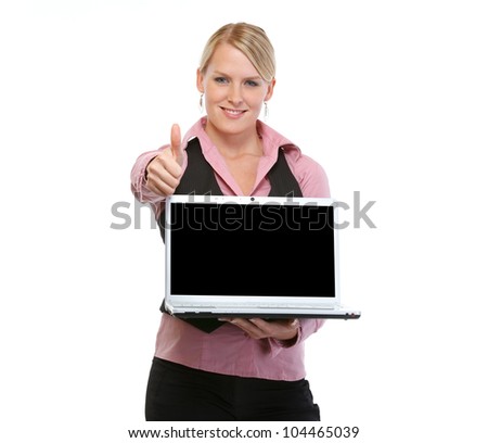 Woman with showing laptops blank screen and thumbs up